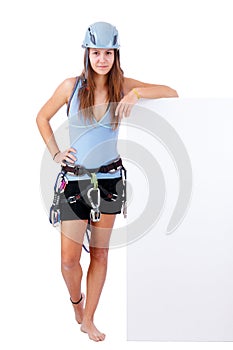 Climbing woman holding a banner