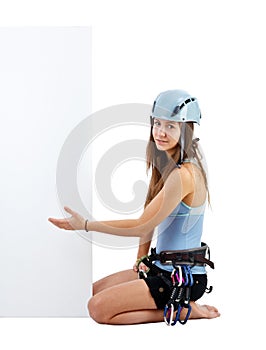 Climbing woman holding a banner