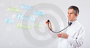 Clinical doctor pointing to health and fitness