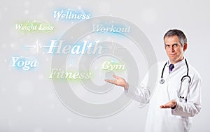 Clinical doctor pointing to health and fitness collection of words