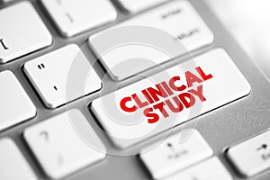 Clinical Study - type of research study that tests how well new medical approaches work in people, text concept button on keyboard