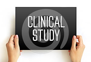 Clinical Study - type of research study that tests how well new medical approaches work in people, text concept on card