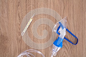 Clinical thermometer and nebulization tool for pneumonia