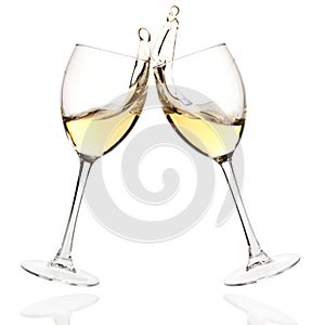 Clink glasses with white wine photo
