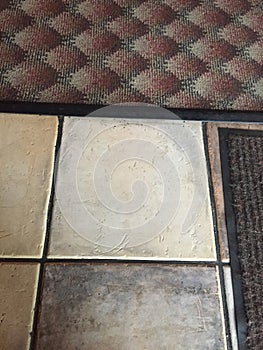 Clinker floor with two doormats on