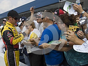 Clint Bowyer signs autographs