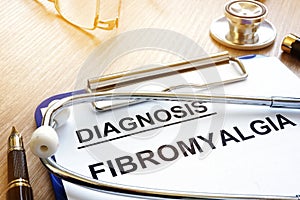 Clipboard with diagnosis fibromyalgia. photo