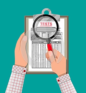 Clipboard with exam test answer sheet in hand