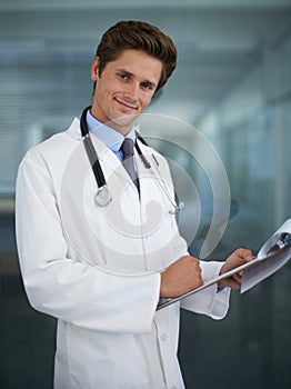 Clipboard, happy and portrait of doctor in his office for diagnosis or treatment at medical hospital. Checklist, career