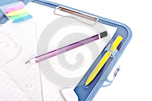 Clipboard with pen, setsquare, eraser and pencil