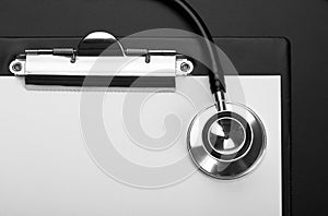 Clipboard with stethoscope