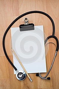 Clipboard with stethoscope