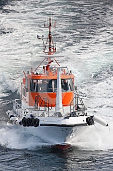 Clipping Norwegian pilot boat in sea, Scandinavia