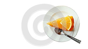 Clipping path and copy space,orange cake on the saucer isolated on white background,tasty sweet dessert on white plate