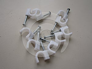 Clips for fastening electrical wiring