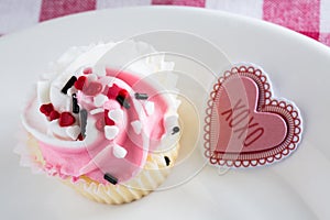 Cloce Up Valentines Day Cupcake and Sign