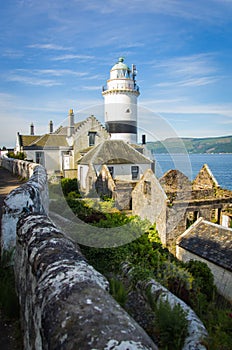 The Cloch Lighthouse with other houses in Cloch Point - Inverclyde in Scotland