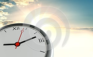 Clock against the background of sunrise