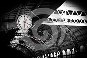 Clock on the background of the old station