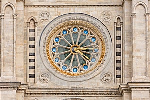 Clock on the Basilica of Saint Denis. Paris, France photo