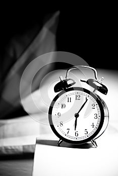 clock on a beautiful background old time alarm clock wake up