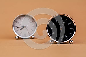 clock. Beautiful modern clock lies on paper background. time clock time standstill time off work working with time time