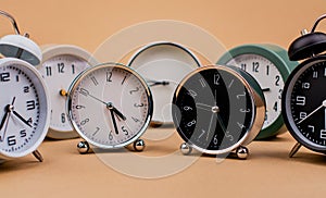 clock. Beautiful modern clock lies on paper background. time clock time standstill time off work working with time time