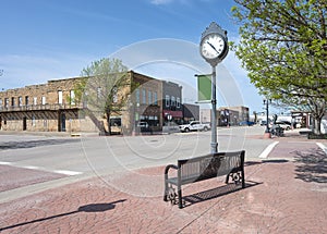 Clock and Bench on State Street in Belle Fourche photo