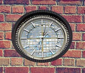 Clock on brick wall