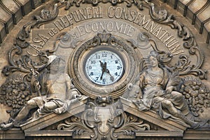 clock on the CEC Palace building in Bucharest