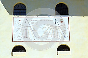 clock closed brick tower italy lombardy window