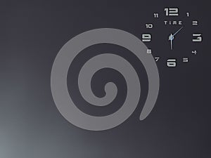 Clock on dark wall texture with free copy space. The 12th numbers of time and letter T I M E are silver color. Clockwise is