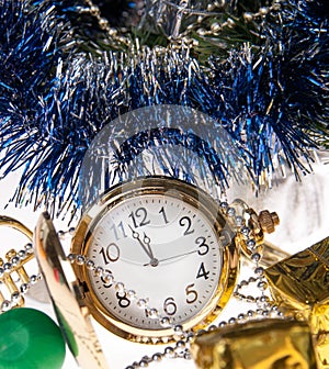 Clock, decorations on the background tree