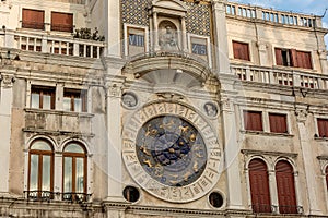 Clock dell`Orologio on St Mark`s Square San Marc in Venice, Italy. Detail with clock face and astrological Zodiac signs