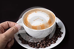 clock drawing on latte art coffee cup