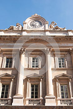 Clock and facade of Santa Maria Annunciata in Camposanto