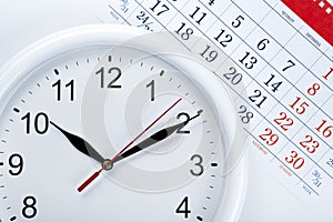 Clock face and calendar sheet with numbers