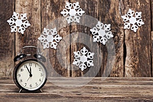 Clock with five mintes to twelve o`clock