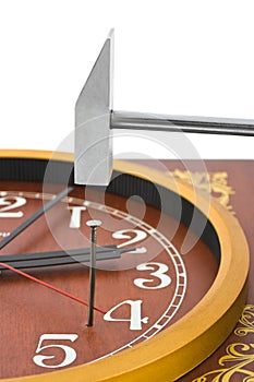 Clock, hammer and nail