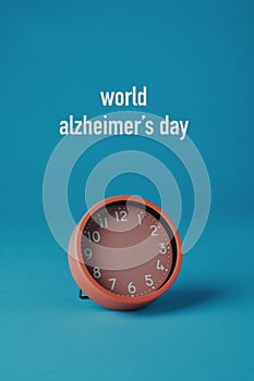 clock without hands and text world alzheimers day