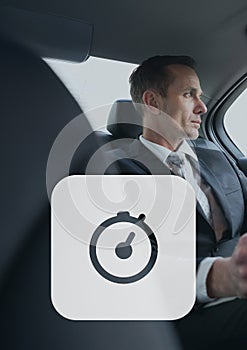 Clock icon against man in the car