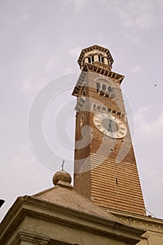 Clock on Lamberti Tower on Piazza delle Erbe