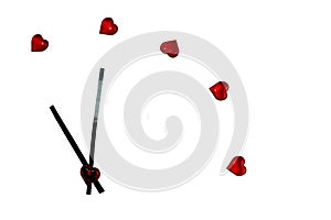 Clock made of plastic hearts on a white background