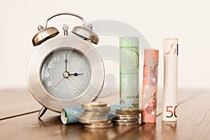 Clock with money, time is money