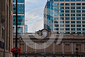 Clock on overpass of train station in downtown Chicago Loop during summer. photo