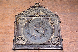 Clock on Palazzo Mercanzia Building; Bologna photo