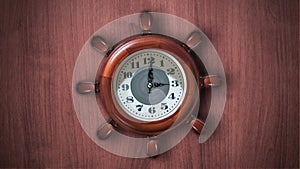 Clock in the shape of a ship`s helm