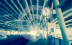 Clock at the sky-train station,vintage tone