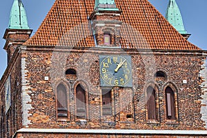 Clock at the spire of a medieval church in Greifswald