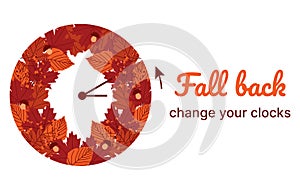 Clock switch to winter time. Daylight saving time ends. A clocks in a floral frame of autumn orange foliage and turning